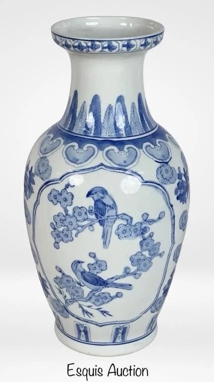 intage Chinese Asian Blue & White Porcelain Vase: A classic vintage Chinese blue and white porcelain vase, standing 14" tall. The vase is adorned with intricate floral and bird motifs, beautifully hand-painted in rich cobalt blue. The elegant design 