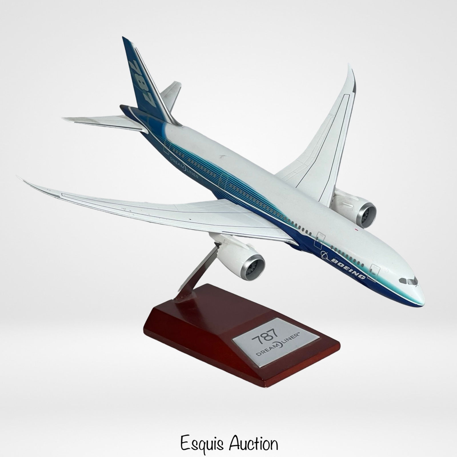Boeing 787 Dreamliner Die-Cast Aircraft Model: This is a high-quality die-cast model of the Boeing 787 Dreamliner produced by Hogan. Measuring approximately 11" long, 12" wide, and 9" high (including stand), the model features detailed design elem