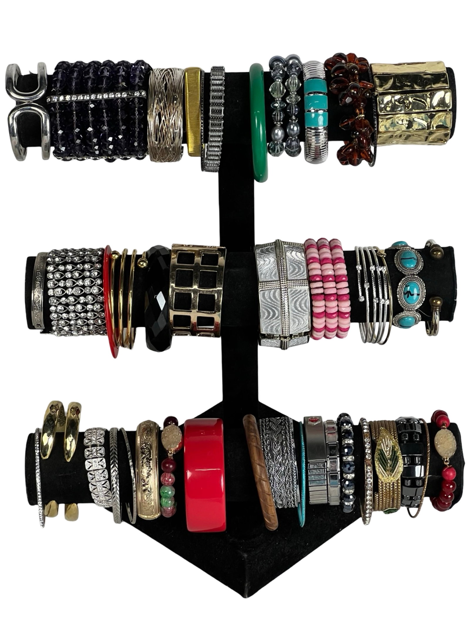 Collection of Lady's Bracelets: Explore a diverse assortment of bracelets, each one offering its own unique style and charm. Display stands are not included.