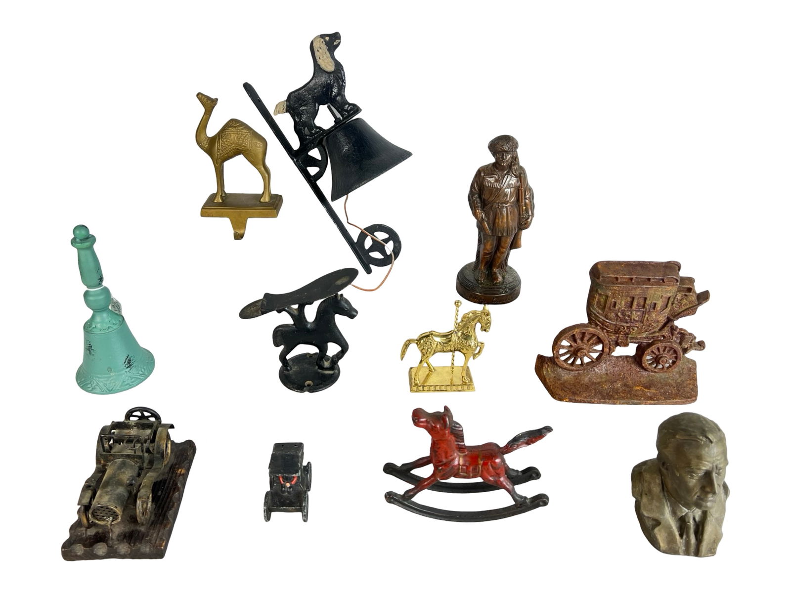 Group of Vintage Cast Metal Figurines, Bells & Min: An eclectic collection of cast metal decorative objects featuring an array of themes and forms. Highlights include a black wall-mounted bell with a cocker spaniel figure, a brass camel wall hook, a br