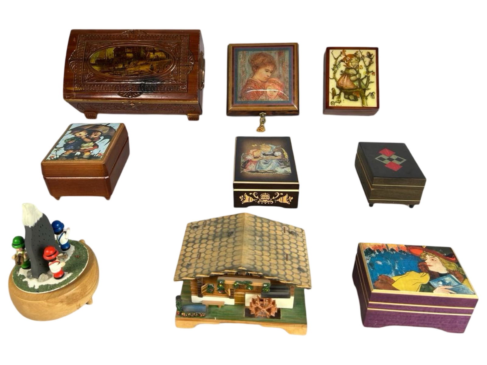 Collection of Keepsake, Jewelry, and Music Boxes: Charming assortment of decorative boxes including hand-painted keepsake boxes, lacquered wooden jewelry boxes, and whimsical music boxes. Designs range from classic Hummel-inspired illustrations and m
