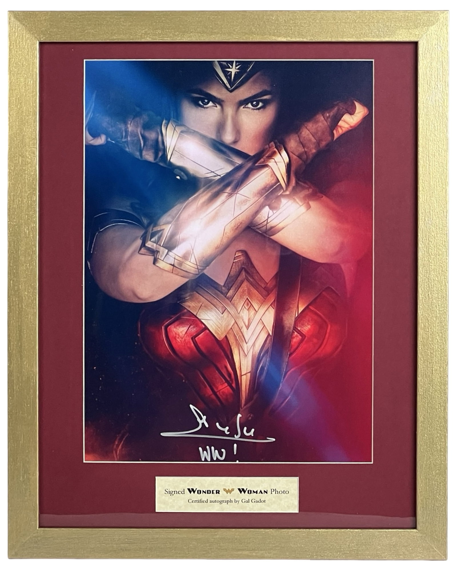 Gal Gadot Signed Wonder Woman Custom Framed Photo: Striking custom-framed photo featuring a bold autograph by Gal Gadot as Wonder Woman. Showcasing the iconic pose with crossed gauntlets, this image captures the power and presence of one of the most i