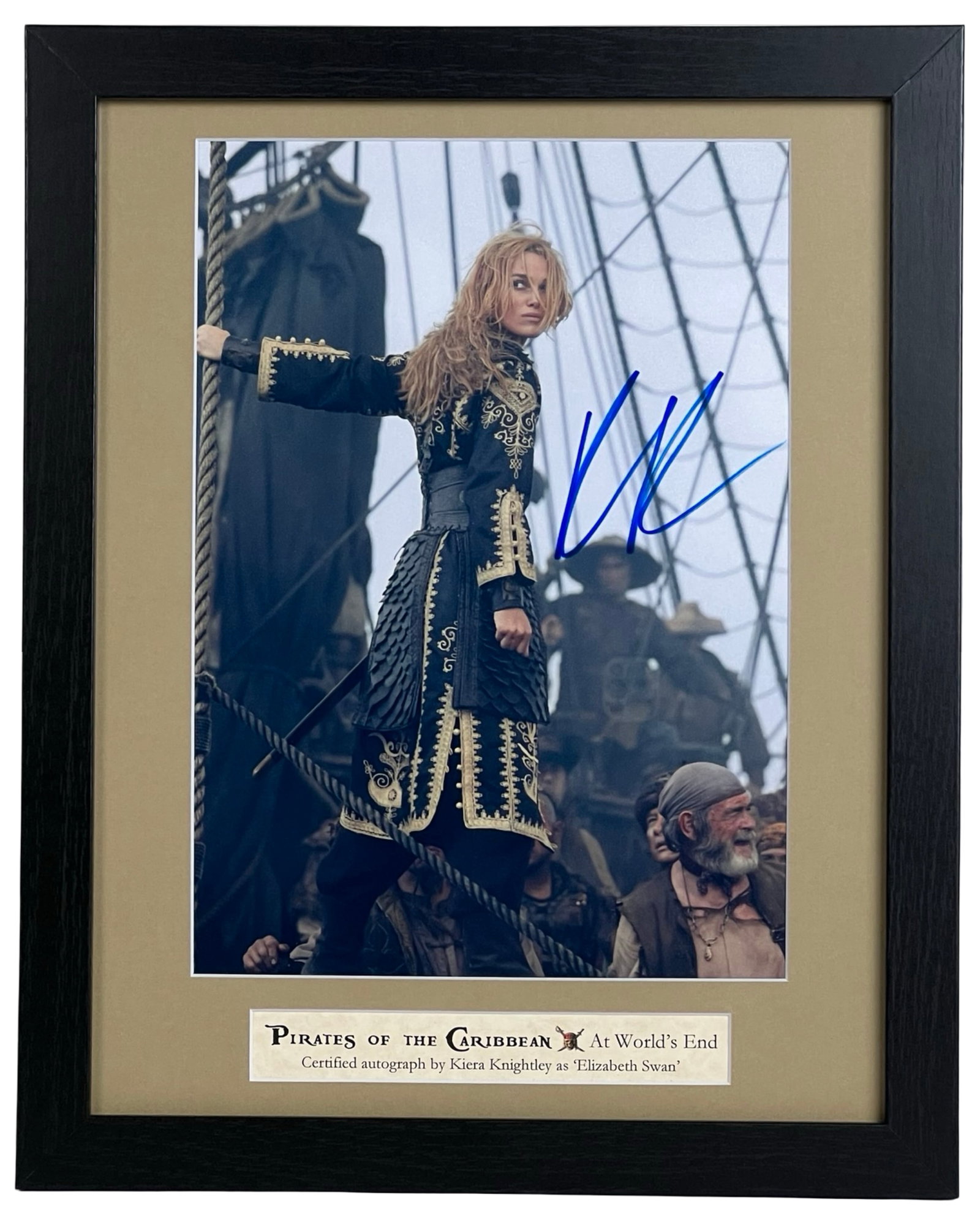 Keira Knightley Signed Pirates of Caribbean Photo: Custom-framed photograph autographed by Keira Knightley, captured in her commanding role as Elizabeth Swann from Pirates of the Caribbean: At World's End. A dynamic collectible for fans of the swashbu