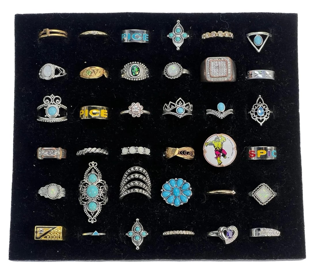 Exquisite Collection: Set of 36 Various Rings: Embark on a journey through diverse styles and eras with this stunning collection of 36 rings, each possessing its own unique charm and character. From timeless classics to contemporary statement piec