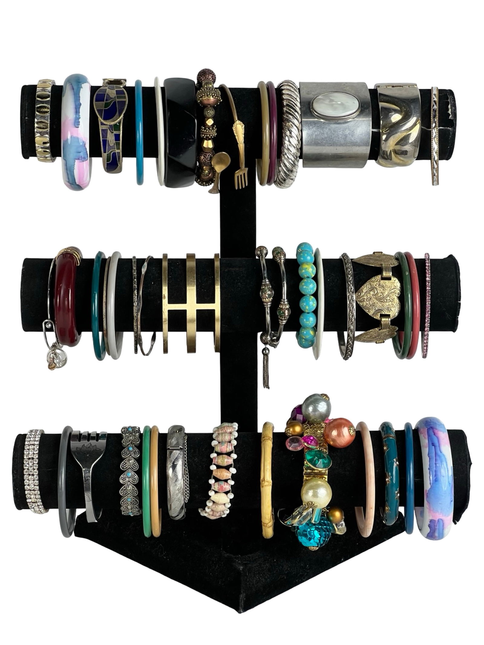 Collection of Lady's Bracelets: Explore a diverse assortment of bracelets, each one offering its own unique style and charm. Display stands are not included.