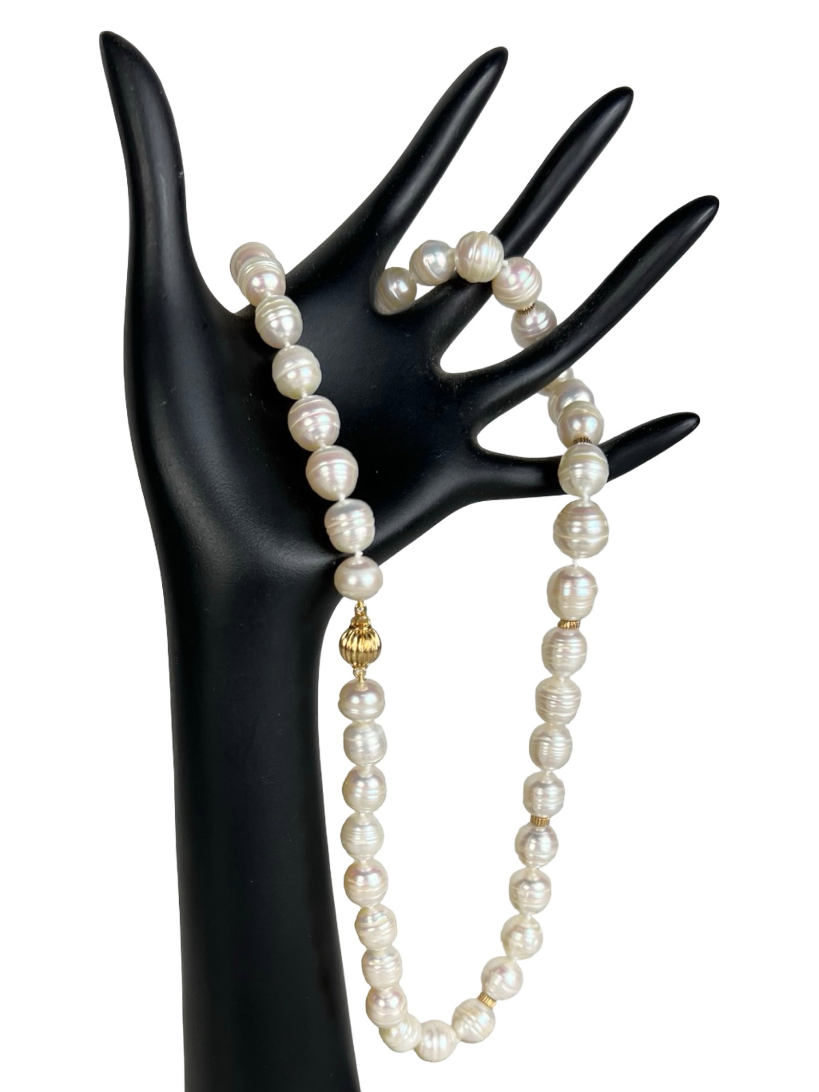 Large Baroque Pearl Necklace with 14K Gold Clasp: Elegant 18" necklace featuring large white baroque pearls with a lustrous finish and natural ridged texture, interspaced with 14K gold ribbed spacers. Secured with a matching 14K gold fluted clasp, th