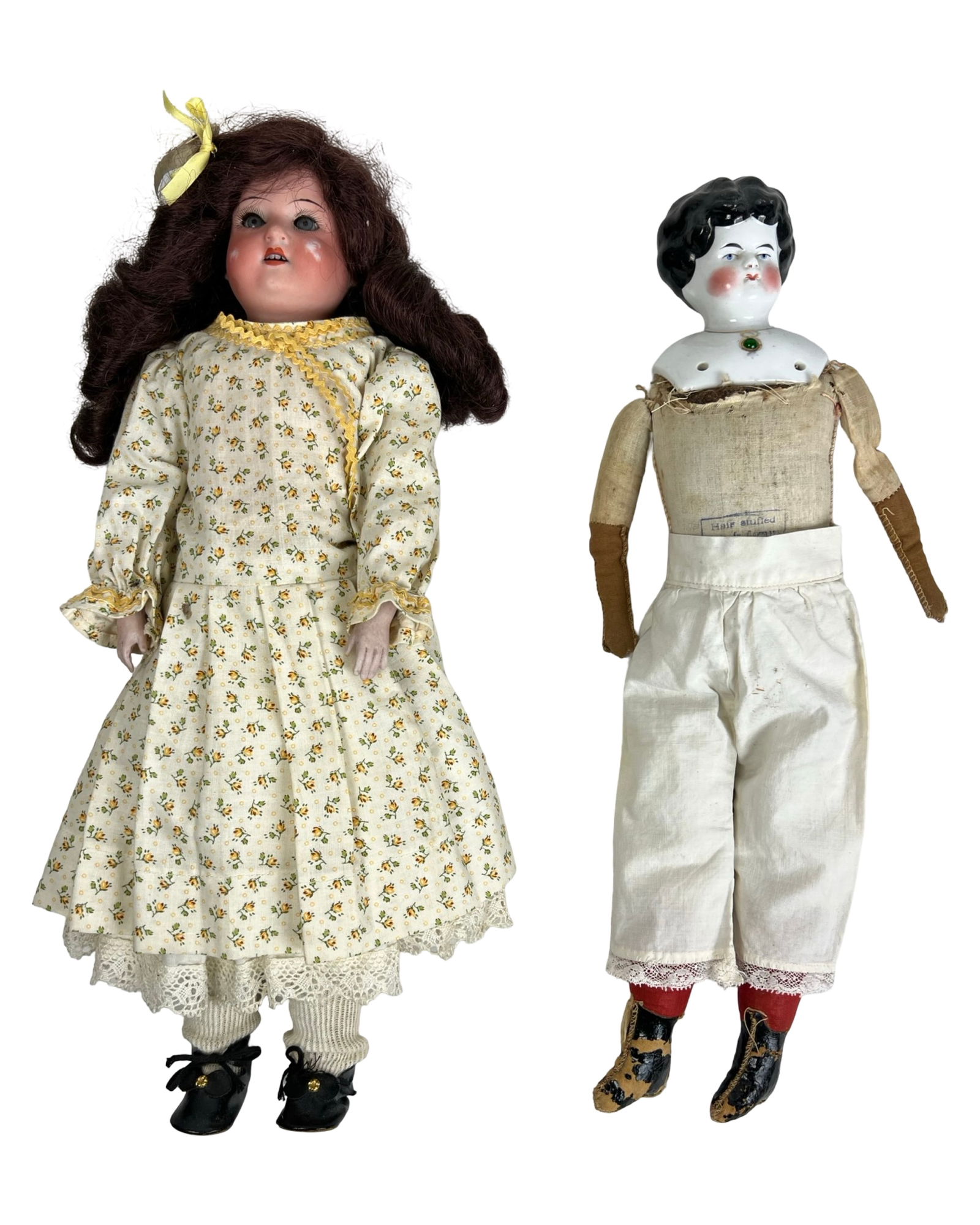 Antique German Bisque Doll by Ernst Heubach & Chin: Pair of late 19th-century German dolls, including a 17" bisque head doll marked "Germany 325" by Ernst Heubach, featuring sleep eyes, open mouth with teeth, and composition limbs on a stuffed cloth bo