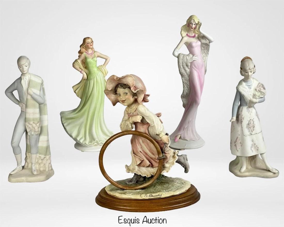 Giuseppe Armani, Porceval, Valentino Figurines Lot: 5 elegant porcelain and bisque figurines including works by Giuseppe Armani, Porceval, and Valentino, ranging from 10" to 12" tall. Good overall condition. Giuseppe Armani "Hoop & Stick" has repaired