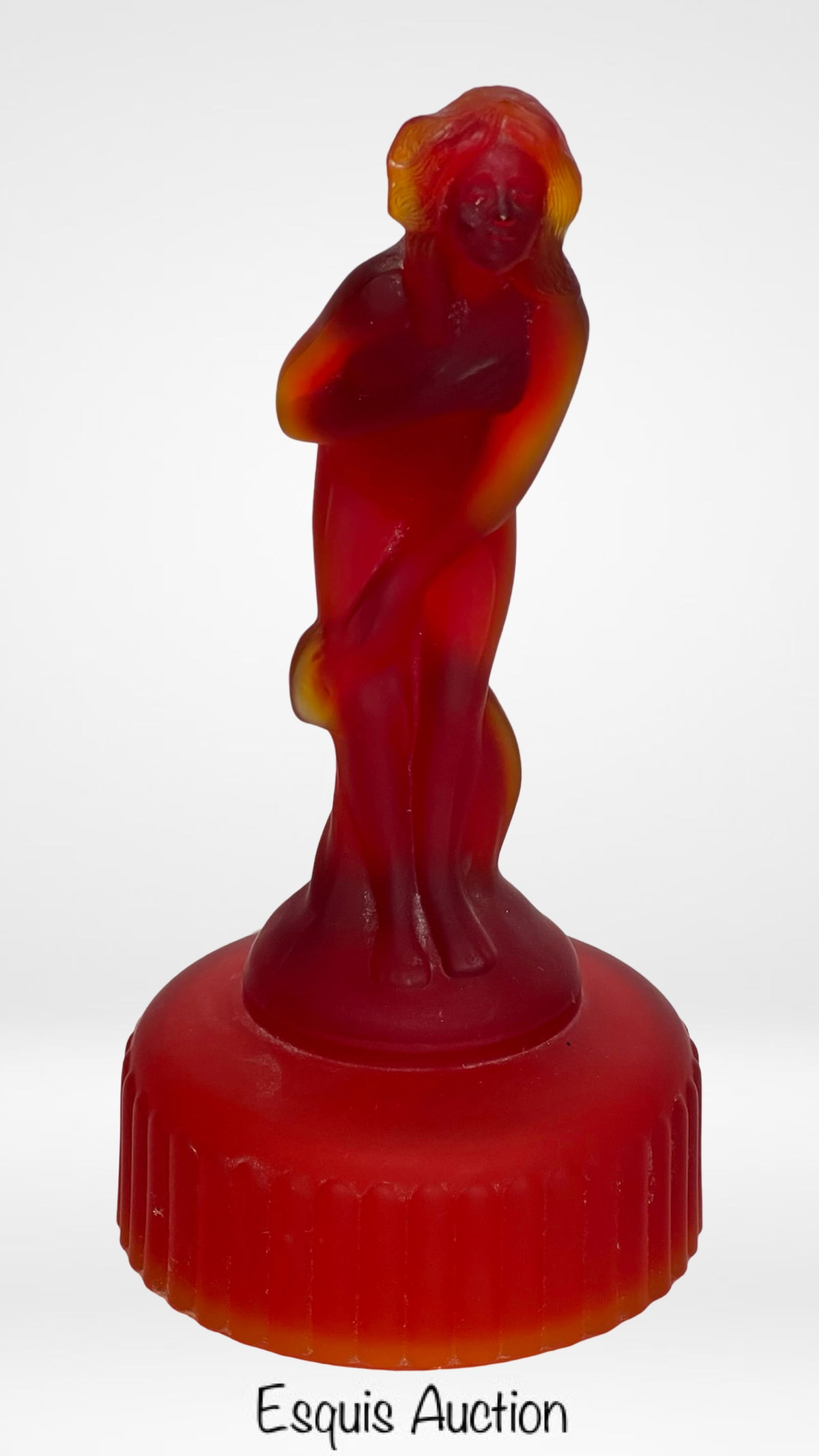 Imperial Glass Venus Rising Bashful Nude Figurine: Striking vintage figurine titled Venus Rising by Imperial Glass, featuring the classic "bashful nude" form inspired by the goddess Venus. Rendered in rich red Amberina glass, the figure transitions fr