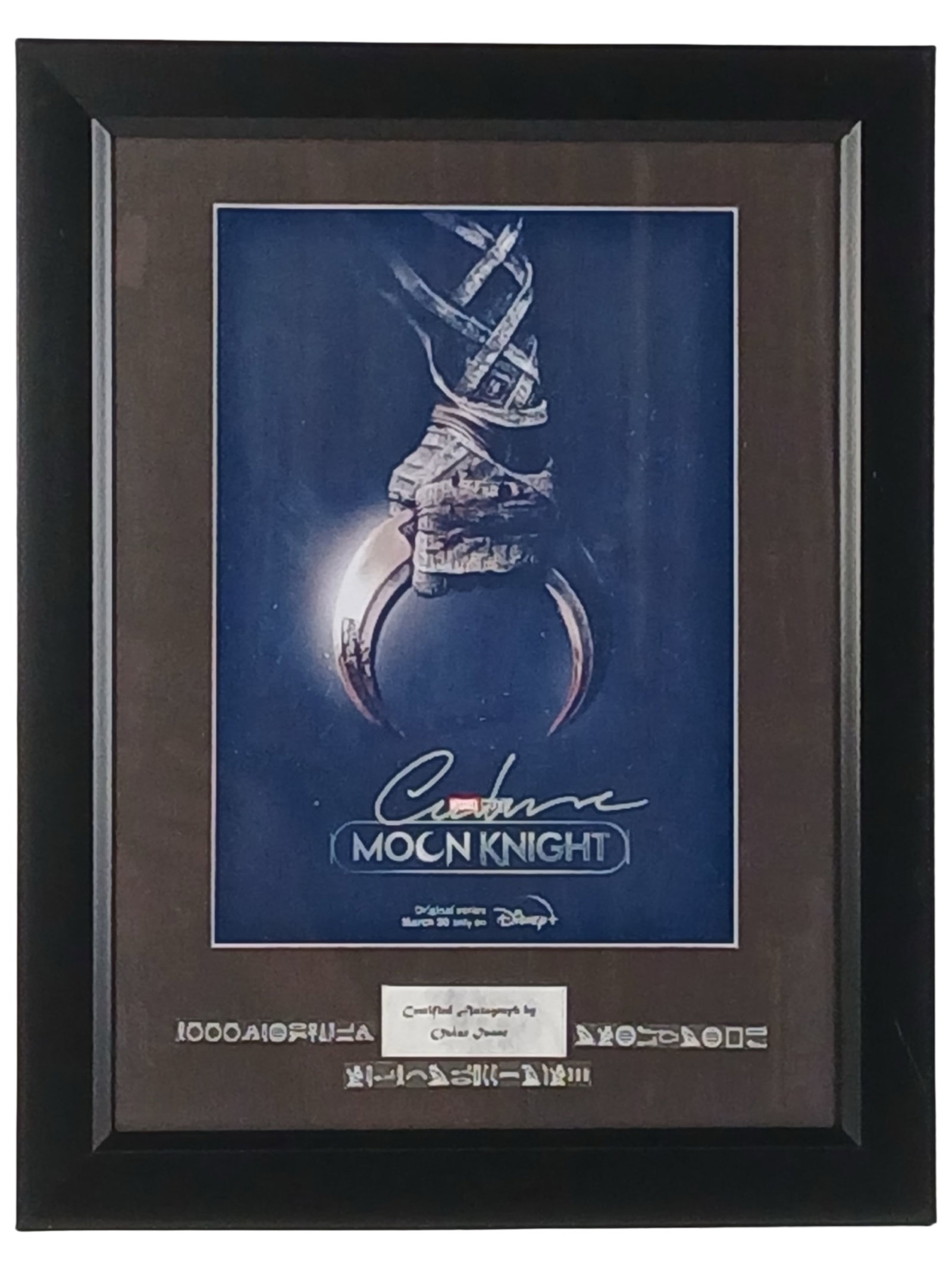 Oscar Isaac- Moon Knight Autographed Photograph: Promotional photograph for Marvel's Moon Knight, boldly signed by Oscar Isaac, who stars as the mysterious and tormented vigilante. A must-have collectible for Marvel fans, professionally framed at 18