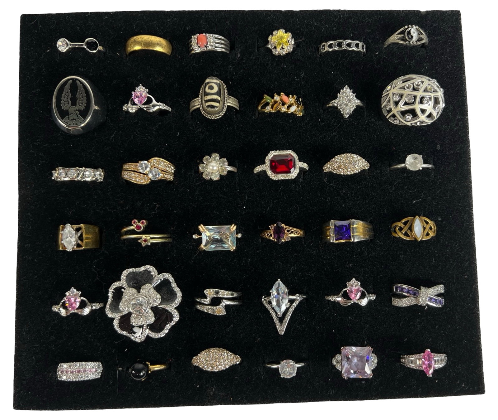 Elegance for Every Finger- Collection of Rings: Indulge in the allure of elegant adornments with this exquisite Collection of 36 Various Rings. From timeless classics to contemporary statements, this assortment caters to diverse tastes, offering a 