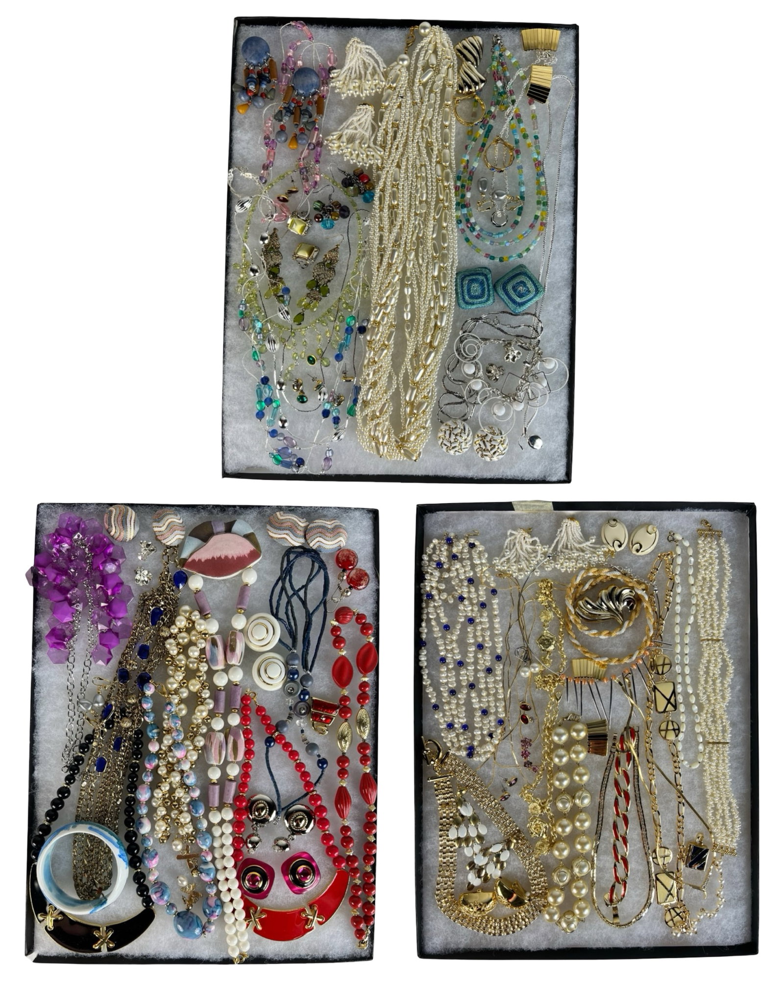 Assortment of Costume Jewelry - Sparkling Variety: Elevate your style with this dazzling Assortment of Costume Jewelry. Bursting with variety, this collection features an array of necklaces, earrings, bracelets, and more, each piece designed to add a 
