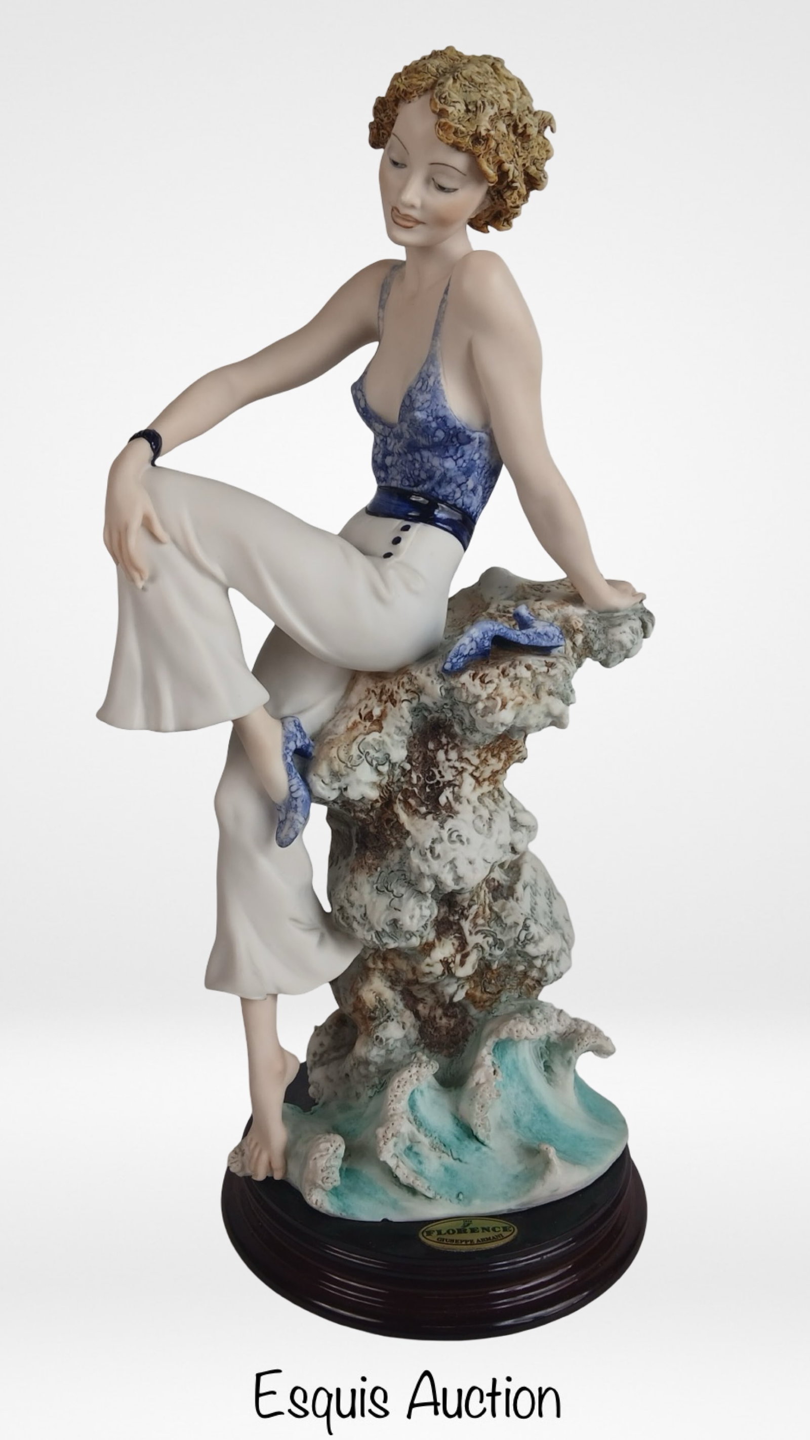 Giuseppe Armani "Sabrina" Beautiful Lady Figurine: Charming Giuseppe Armani "Sabrina" figurine, issued in 1997 as a Society Member's Redemption Piece. Marked 0110C, this intricately detailed sculpture features a young woman seated on coastal rocks, ba