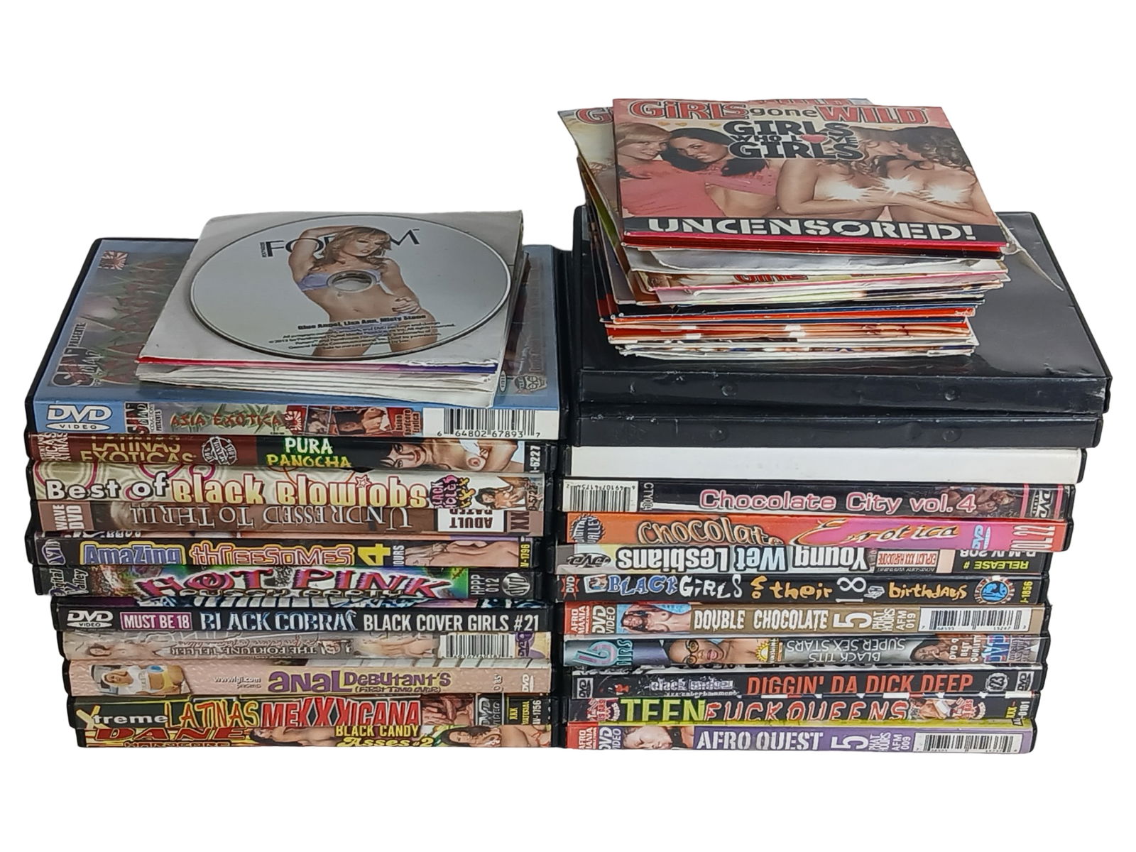 Assortment of Adult XXX DVD Movies incl. Promo: Large lot of adult-themed XXX DVD movies, featuring a variety of genres, titles, and performers. The assortment includes standard retail releases as well as promotional discs such as Girls Gone Wild a