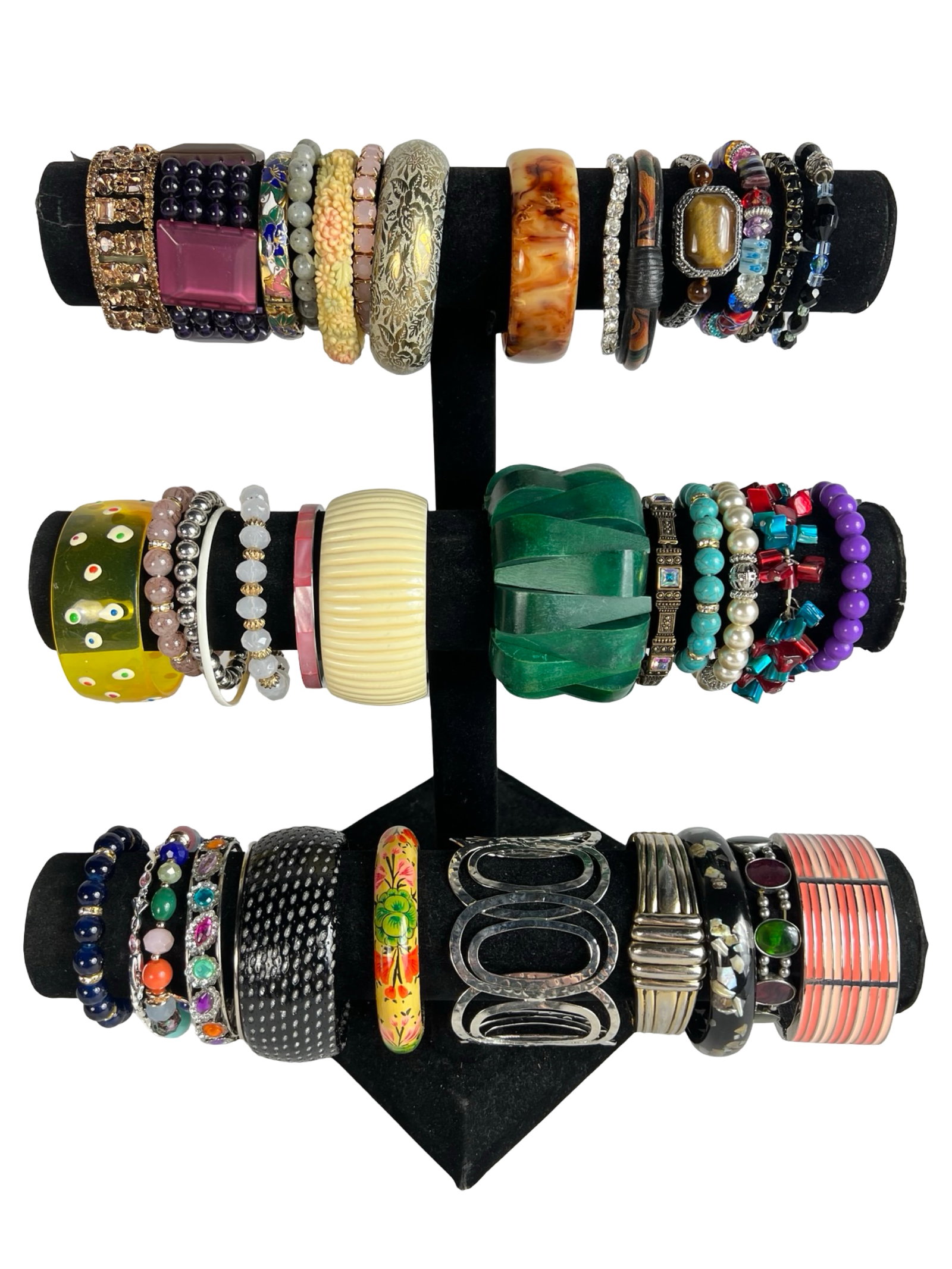Collection of Lady's Bracelets: Explore a diverse assortment of bracelets, each one offering its own unique style and charm. Display stands are not included.