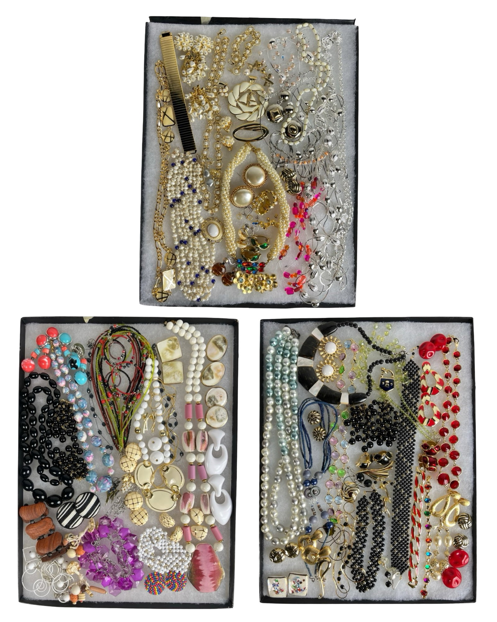 Assortment of Costume Jewelry - Sparkling Variety: Elevate your style with this dazzling Assortment of Costume Jewelry. Bursting with variety, this collection features an array of necklaces, earrings, bracelets, and more, each piece designed to add a 