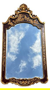 Queen Anne Style Chinoiserie Beveled Wall Mirror: Elegant wall mirror in the Queen Anne style, featuring a richly detailed chinoiserie frame with floral and bird motifs in gold on deep red lacquer. The carved crest is adorned with a classic shell fin