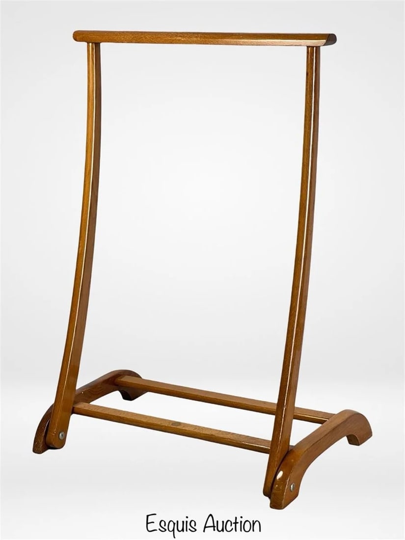 Fratelli Reguitti Mid-Century Italian Blanket Rack: Elegant and functional, this Mid-Century blanket rack by Fratelli Reguitti is a stylish addition to any bedroom or living space. Crafted in Italy, it features a gently curved frame and smooth lines th