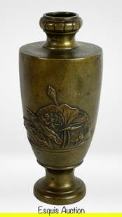 Antique Japanese Meiji Period Bronze Vase: Elegant antique Japanese bronze vase from the Meiji period (late 19th century), finely cast with detailed raised floral motifs on both sides. The surface features rich natural patina, and the sculpted
