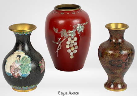 Group of Three Chinese Cloisonne & Lacquered Vases: This lot includes three early 20th-century Chinese vases: a red lacquered vase inlaid with mother-of-pearl grapevine and Chinese calligraphy on the reverse, alongside two cloisonnÃ© enamel vases-one