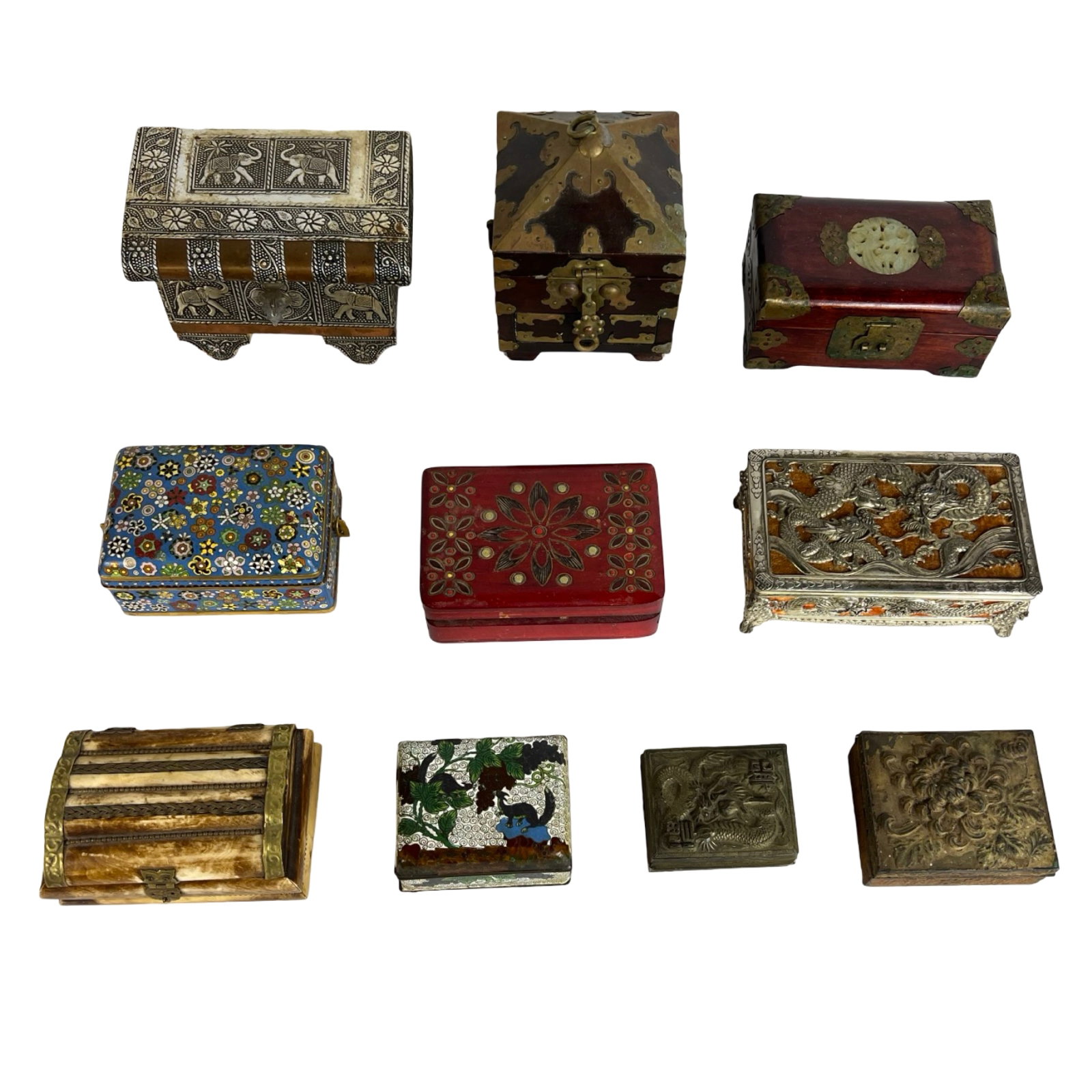 Collection of Vintage Trinket & Jewelry Boxes: This is a diverse collection of 11 decorative trinket and jewelry boxes, each showcasing a range of global styles, materials, and craftsmanship. The set includes an Indian-style silver-plated chest fe
