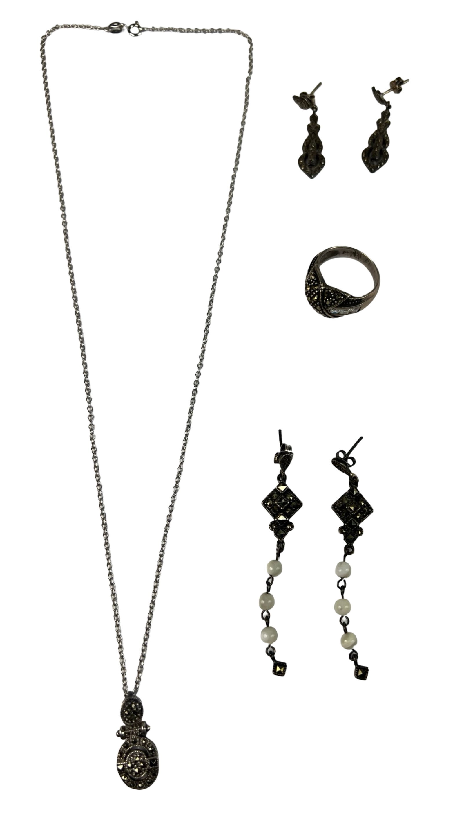 Sterling Silver & Marcasite Jewelry- Necklace, Rin: Sterling Silver & Marcasite Jewelry including Necklace with Pendant, Ring and two Pairs of Earrings. Necklace is 19" long, Ring size- 7 3/4. Good Condition.