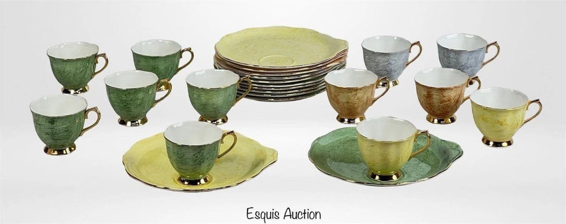 Royal Albert "Gossamer" Bone China Tea Cup Set: This is a beautiful and complete twelve-piece tea cup and saucer set in the highly collectible "Gossamer" pattern by Royal Albert, made in England. Each piece is crafted from fine bone china and showc