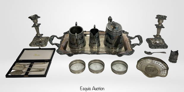 Antique & Vintage Silverplate Serving & Tableware: An eclectic collection of antique and vintage silverplate pieces, including ornate tea service, decorative trays, candlesticks, and flatware. Highlights include a Meriden B Company quadruple plate tea