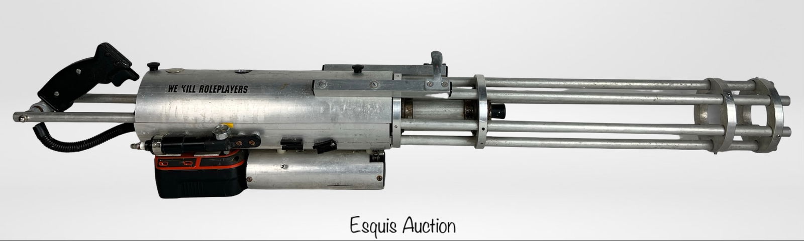 Custom Paintball Mini-Vulcan Minigun: Unique custom-made paintball minigun modeled after the Vulcan-style rotary design. Marked with the phrase "WE KILL ROLEPLAYERS" on the side, this piece includes a mounted rechargeable 18V Ni-Cd batter