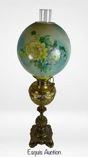 Antique Gone with the Wind Oil Lamp- Miller Lamp C: A stunning example of late 19th to early 20th-century American lighting, this antique "Gone with the Wind" oil lamp was produced by The Miller Lamp Company and stands an impressive 31 1/2 inches tall.