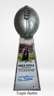 Mike Ditka Autographed Football Trophy Tribute: 14-inch commemorative football trophy tribute autographed by NFL legend Mike Ditka. The piece features a sculpted silver-tone football atop a textured pedestal with a full-color image of Ditka in coac