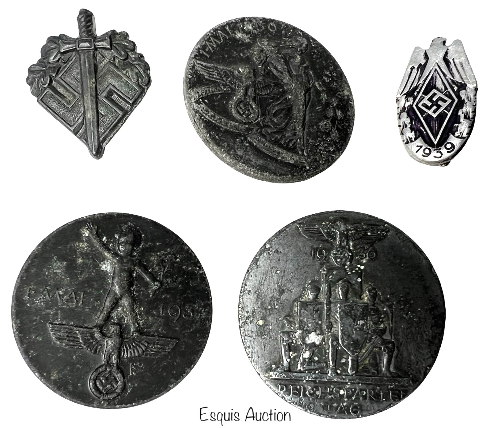 Five WWII German Political & Commemorative Badges: Collection of five original WWII-era German badges, including various political and commemorative types. This lot features a 1937 May Day badge, 1939 May Day badge, NSKOV (Disabled Veterans' Organizat