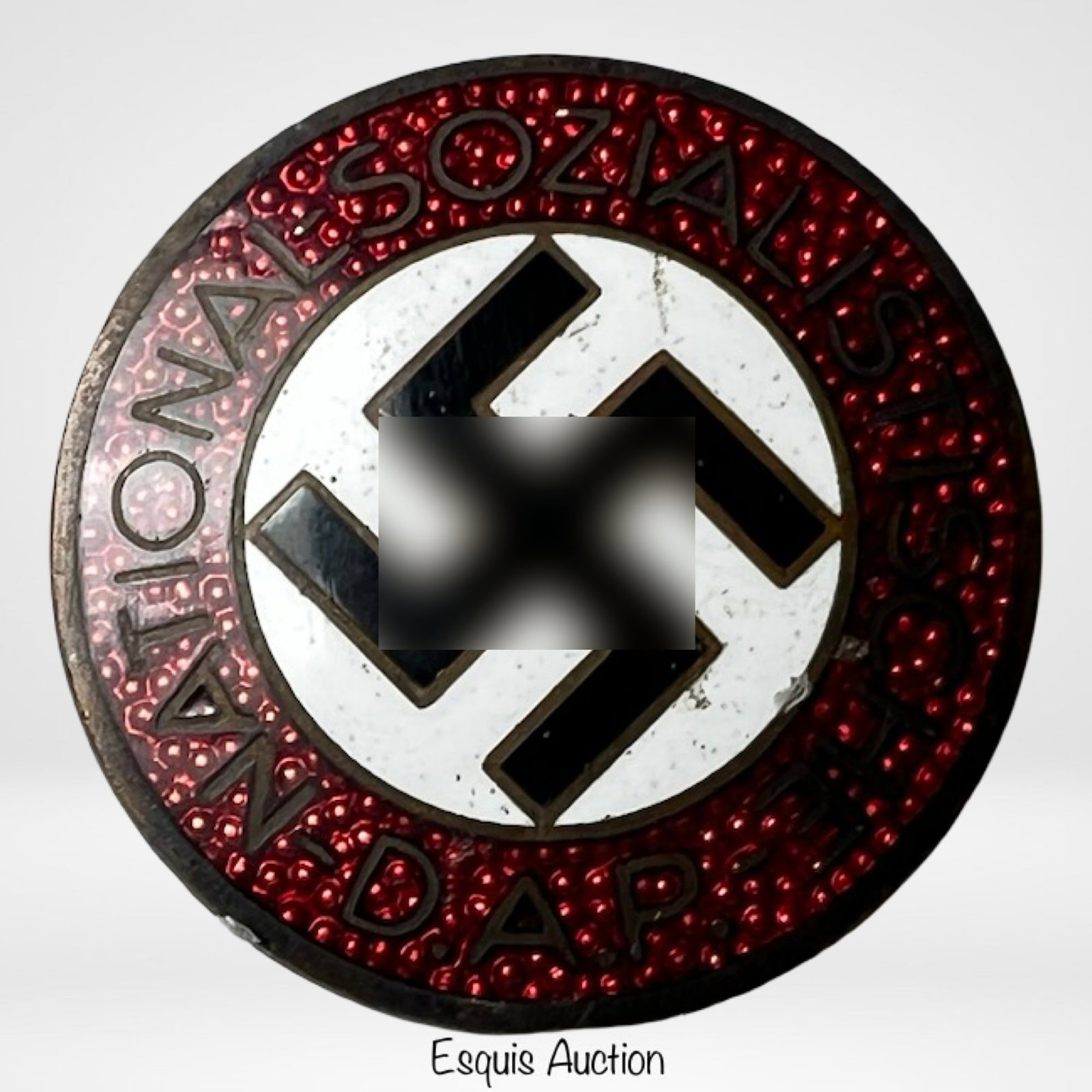 WWII German NSDAP Party Enamel Membership Pin: World War II-era enameled party membership badge, featuring raised red enameled lettering and a white central field. The reverse bears the maker's code "M1/105" and RZM mark, indicating manufacture by