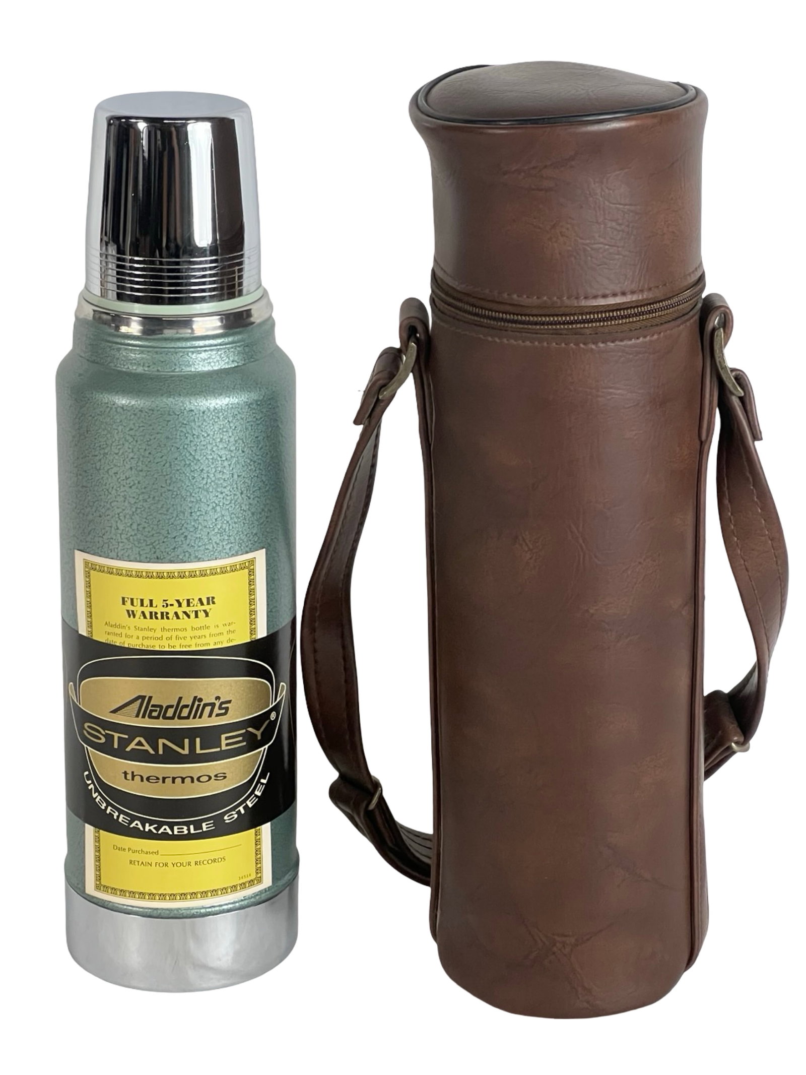 Vintage Aladdin Stanley One-Quart Thermos- New: Vintage Aladdin Stanley thermos bottle in unused condition, complete with its original brown carrying case. Made in the U.S.A. by Aladdin Industries, Nashville, Tennessee, this one-quart vacuum bottle