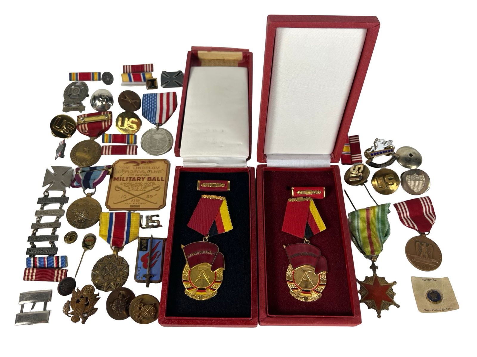 U.S. Army Military Insignia, Medals, Badges, Pins: Extensive mixed lot of primarily U.S. Army military insignia, medals, pins, and badges, featuring both WWII and post-war era examples. Includes various service ribbons, rank insignia, unit crests, and