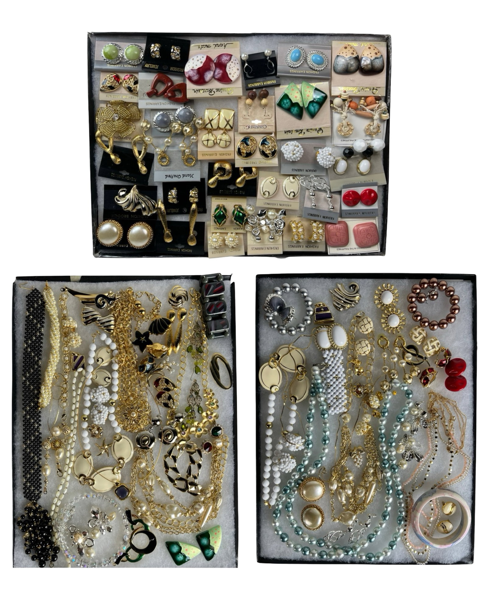 Large Assortment of Costume Jewelry: Chic and eye-catching, this vibrant assortment of costume jewelry includes a wide variety of necklaces, earrings, bracelets, and more-perfect for adding sparkle and personality to any look. The collec