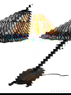 Tiffany Style Stained Glass Table Lamp: Striking Tiffany-style table lamp featuring a vibrant stained glass shade with peacock feather-inspired motifs in jewel tones of amber, purple, turquoise, and red. The wide shade measures approximatel