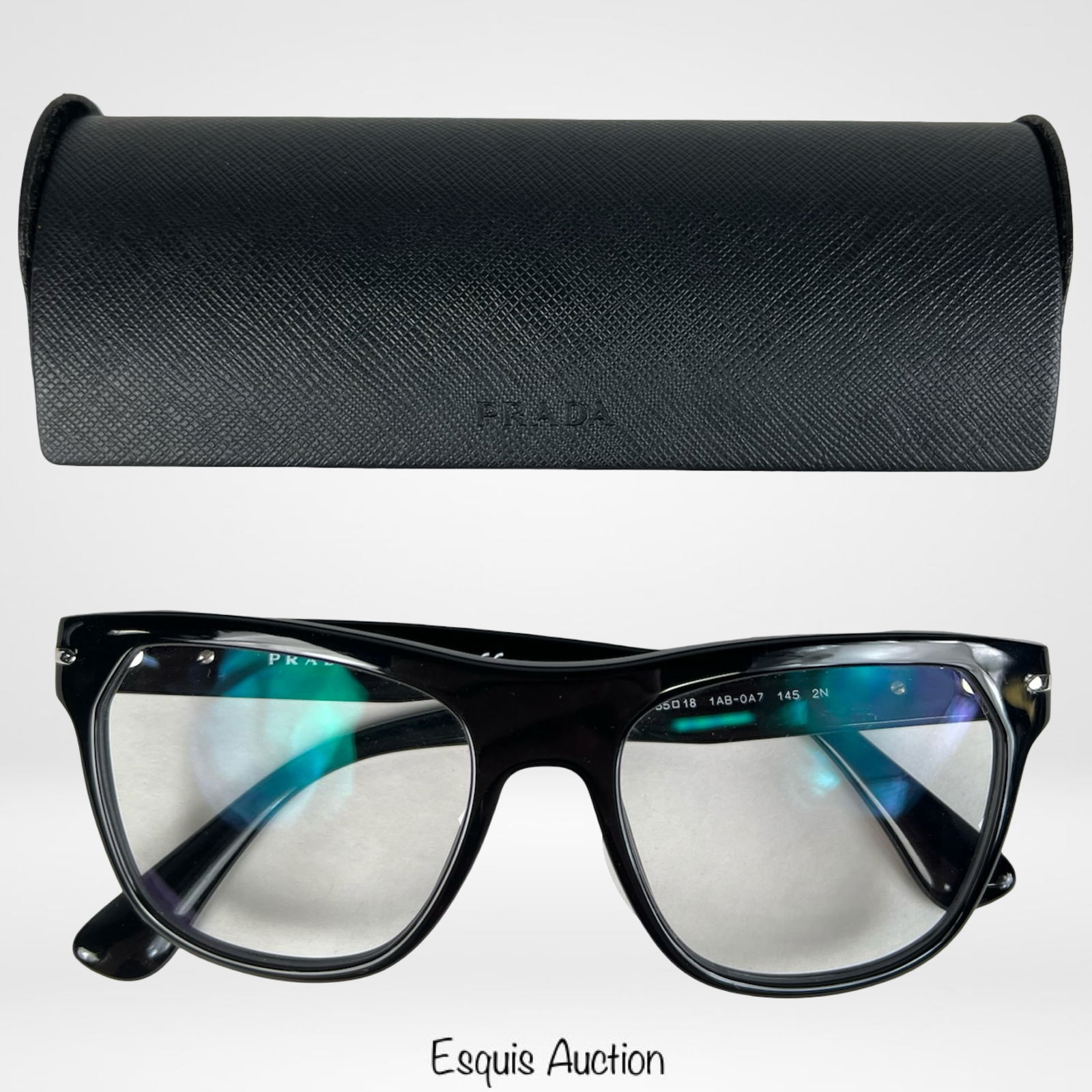 Prada Men's Sport Designer Sunglasses SPR-03R: Sleek and sophisticated, these Prada men's sport designer sunglasses, model SPR-03R, feature a classic black full-rim frame crafted in Italy. The temples are accented with the Prada logo, and the fram