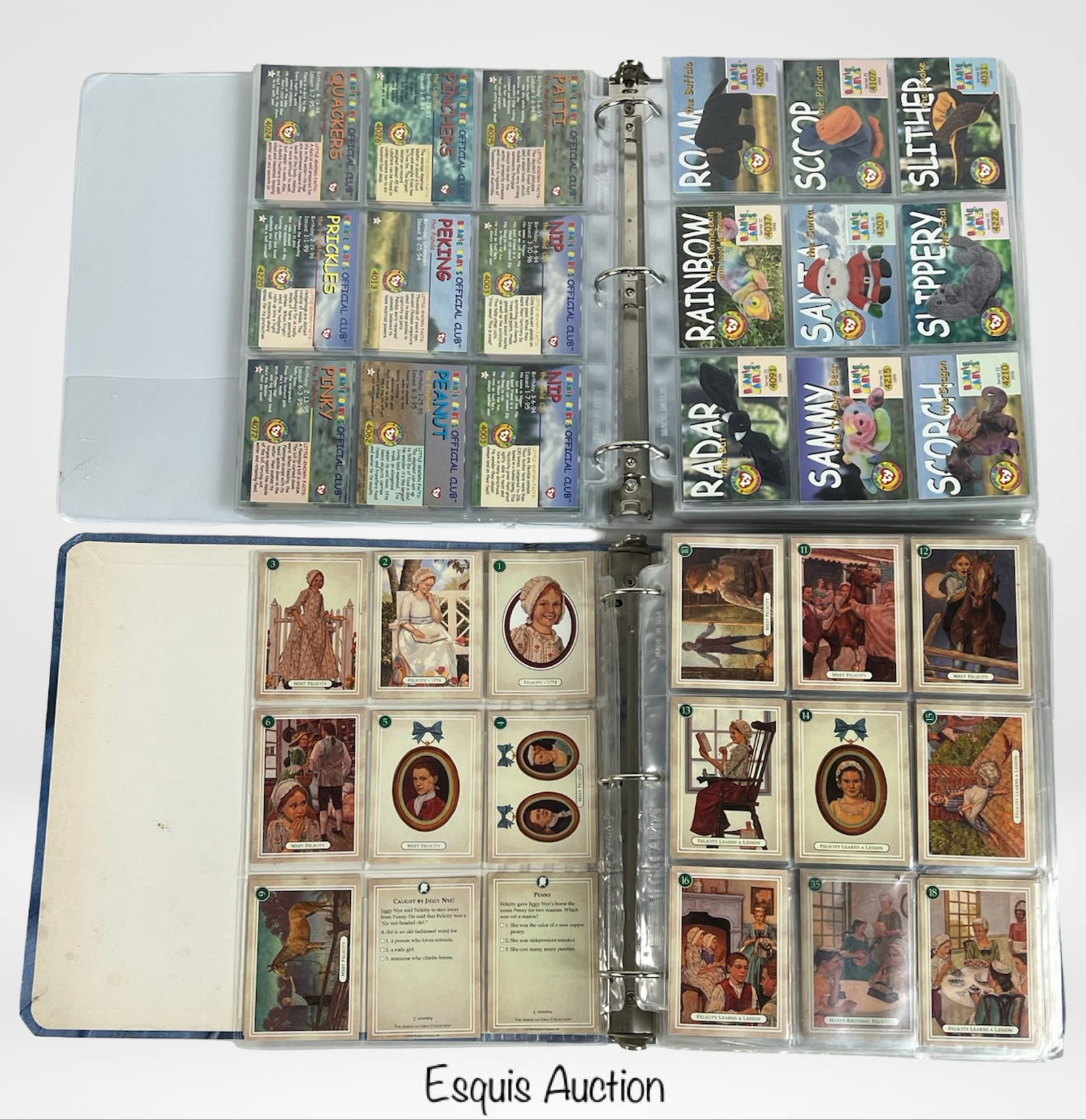 American Girl & Beanie Babies Trading Cards: Pair of binders containing extensive trading card collections. The first binder features vintage American Girl trading cards, showcasing character portraits, illustrated scenes, and descriptive story