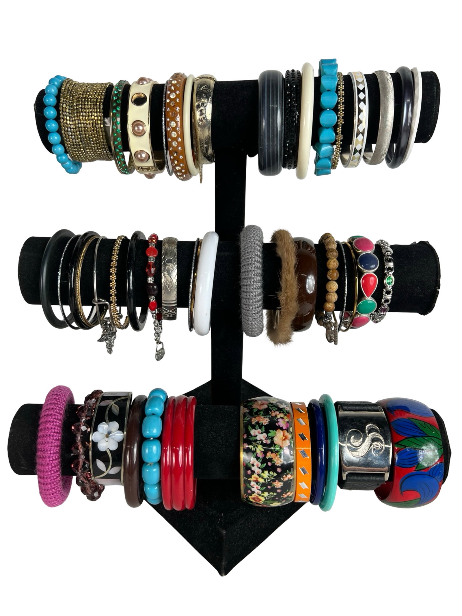 Collection of Lady's Bracelets: Explore a diverse assortment of bracelets, each one offering its own unique style and charm. Display stands are not included.