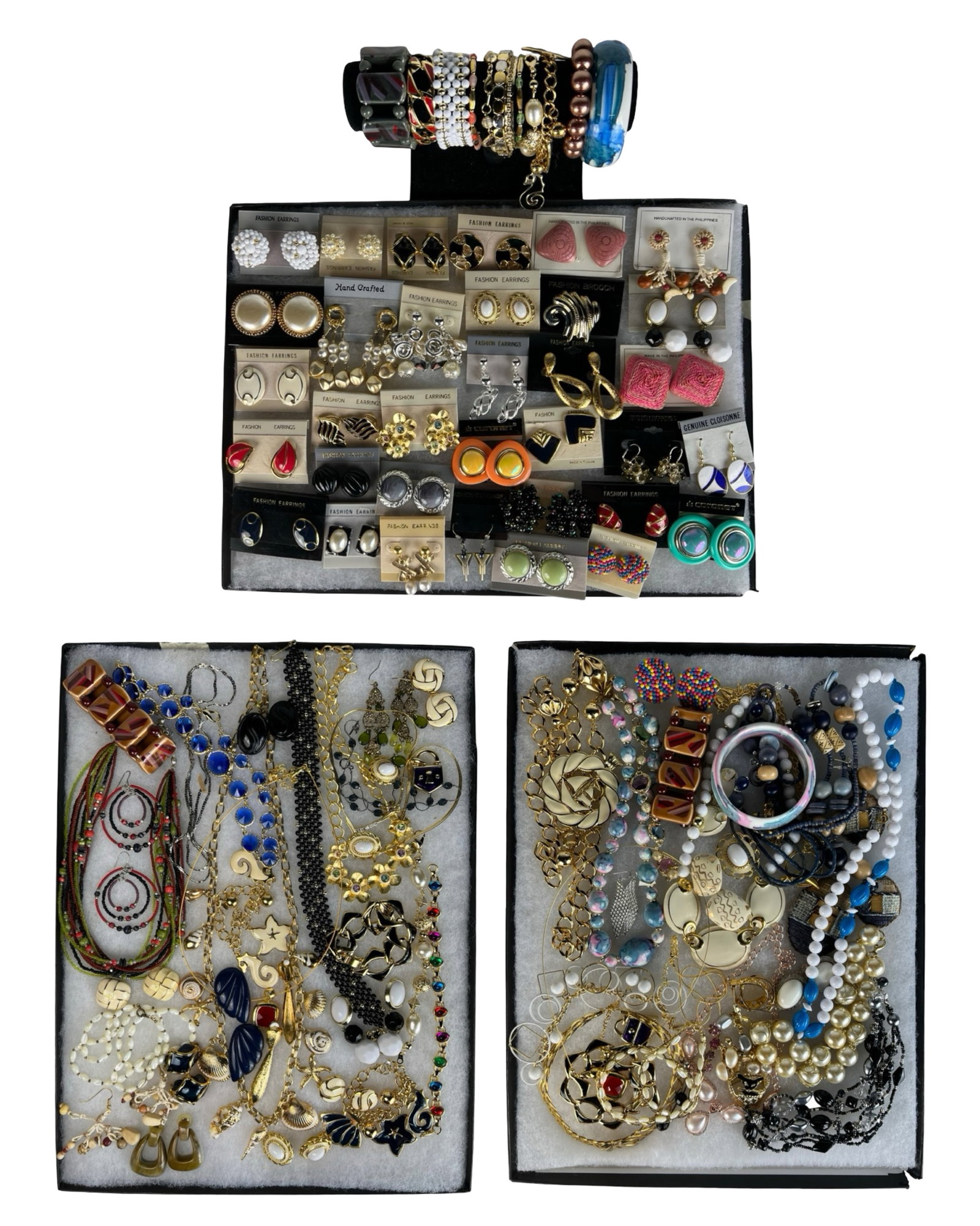 Assortment of Costume Jewelry - Sparkling Variety: Elevate your style with this dazzling Assortment of Costume Jewelry. Bursting with variety, this collection features an array of necklaces, earrings, bracelets, and more, each piece designed to add a 
