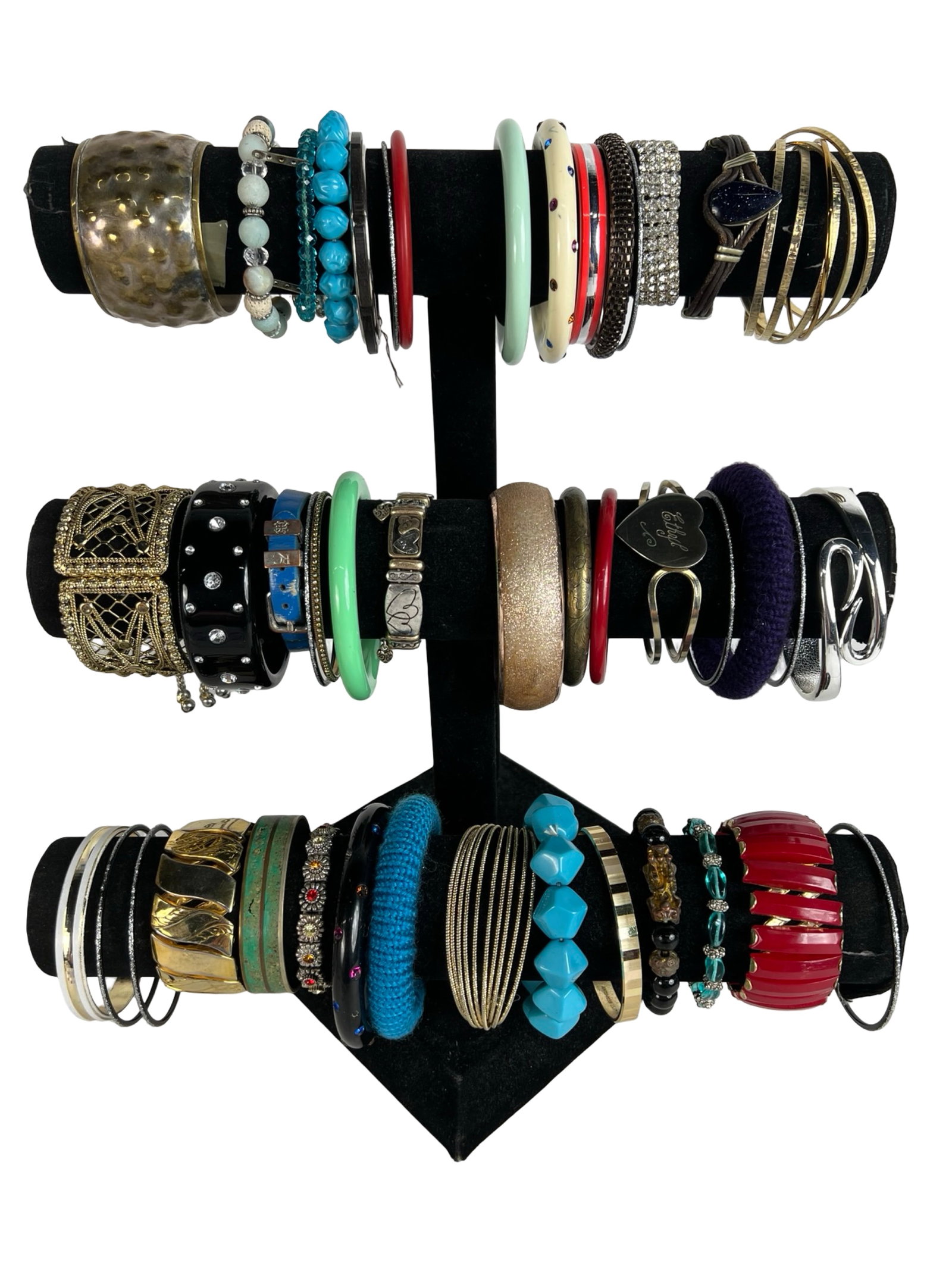 Collection of Lady's Bracelets: Explore a diverse assortment of bracelets, each one offering its own unique style and charm. Display stands are not included.