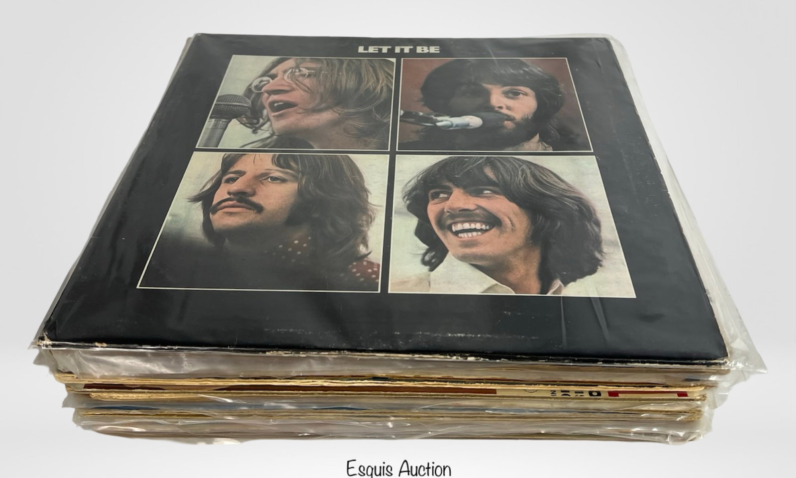 The Beatles Vinyl Record Collection: Step into the golden age of music with this electrifying collection of over twenty Beatles vinyl records, featuring some of the most legendary albums ever pressed. Highlights include Let It Be, Revolv