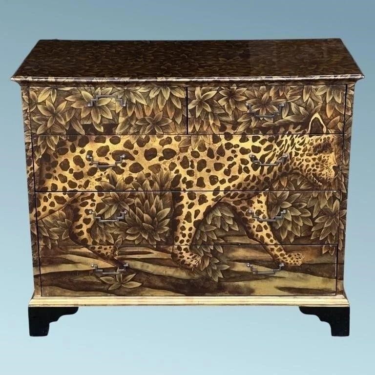 "Leopardo" Four-Drawer Chest - Piero Fornasetti: Make a bold statement in your interior with this striking "Leopardo" drawer chest, crafted in the imaginative style reminiscent of Italian designer Piero Fornasetti. The lithographic surface features 