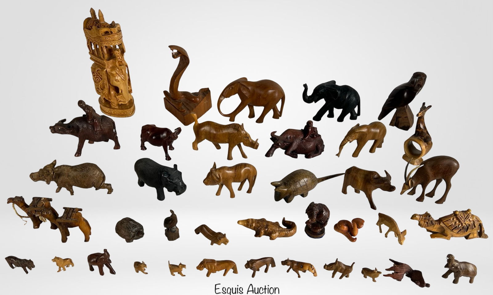 Assortment of Hand-Carved Wooden Animal Figurines (1 of 9)