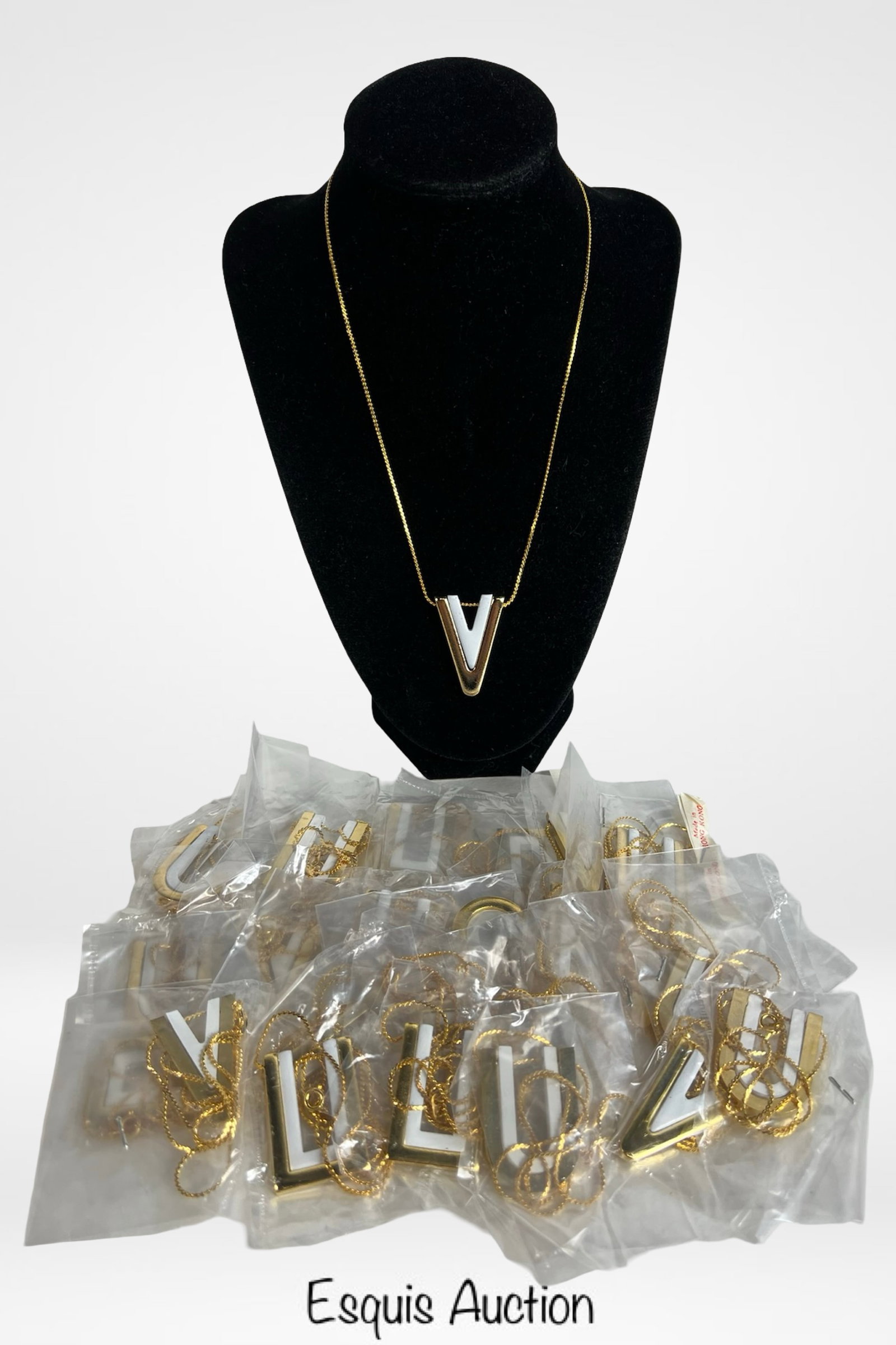 Two Dozen Gold-Tone Necklaces with Letter Pendants (1 of 1)