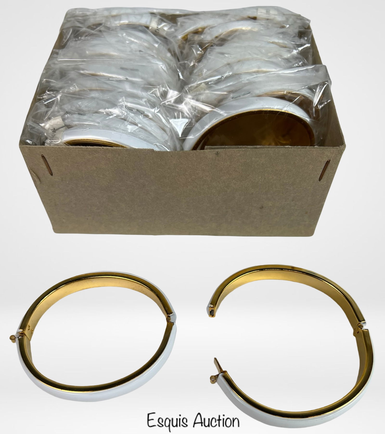 Two Dozen New White & Gold-Tone Bangle Bracelets: Lot of twenty-four (24) vintage new old stock costume jewelry bangles. These hinged bracelets feature a glossy white exterior with gold-tone interior, offering a clean and classic look. Still sealed i