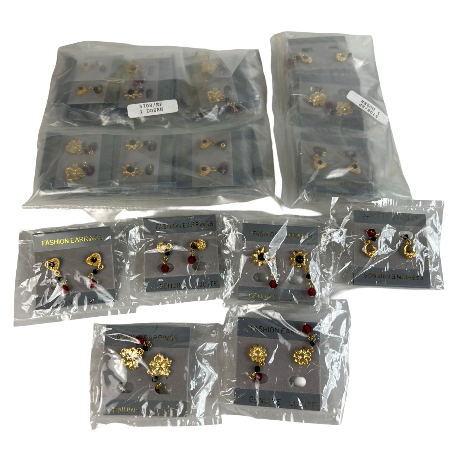 24 Pairs Gold-Tone Fashion Earrings- Red Lucite: Collection of two dozen (24) pairs of vintage costume jewelry earrings, each featuring gold-tone floral and heart motifs accented with red lucite beads. Charming and versatile, these earrings capture