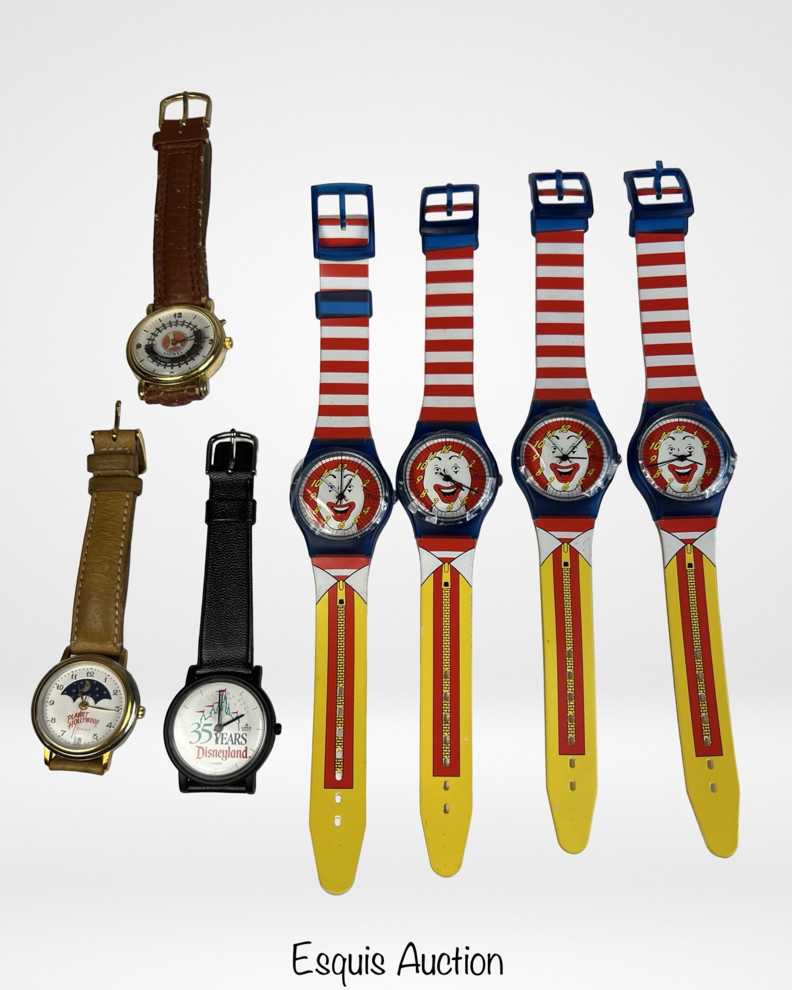 1996 Ronald McDonald Character Watches & Disney: Four 1996 New Ronald McDonald Watches, New Disneyland 35th Anniversary Watch, Lionel Watch (pre-owned) and Planet Hollywood Watch (pre-owned).