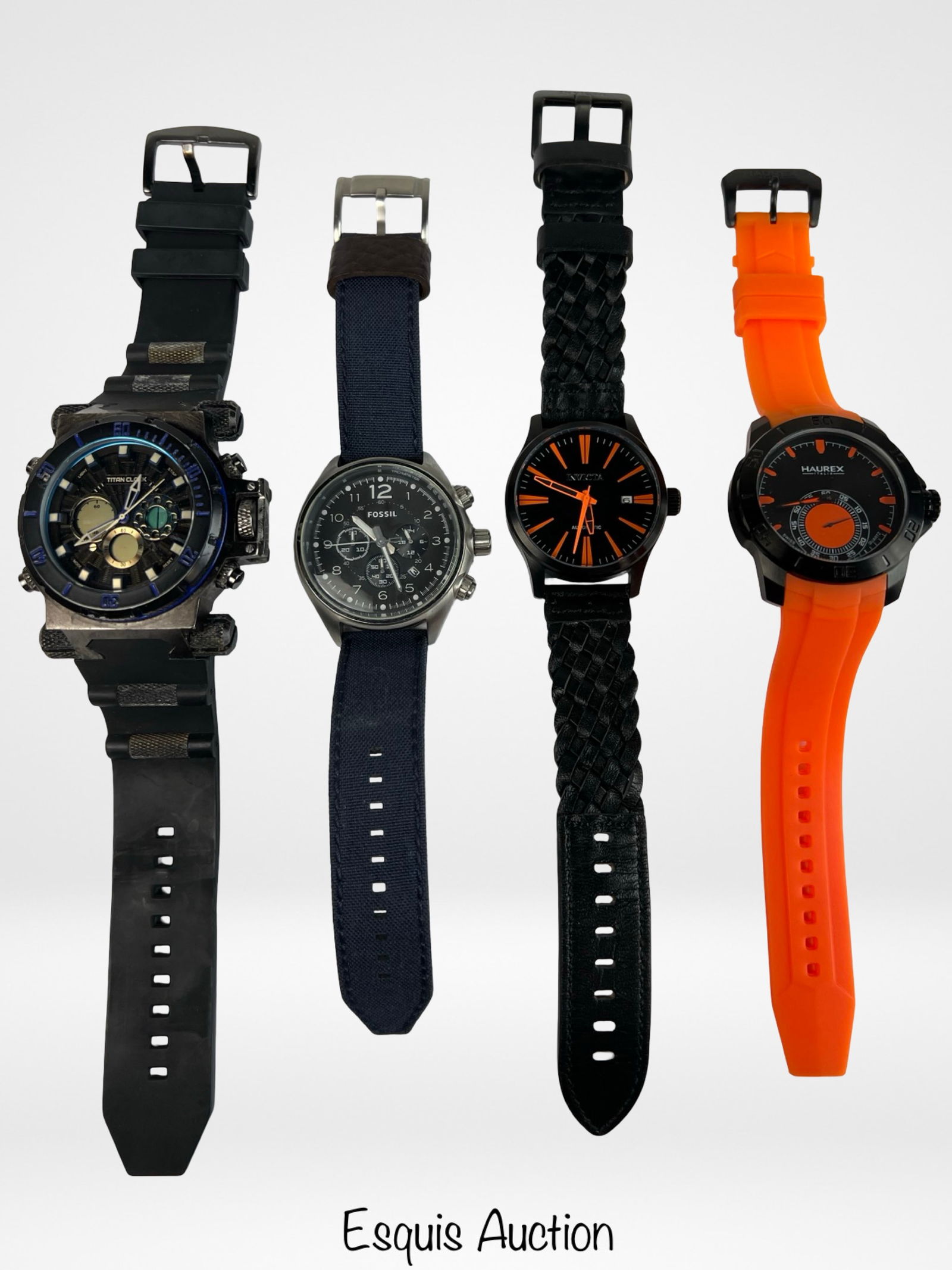 Group of Designer Men's Wrist Watches: Group of Designer Men's Wrist Watches- Titan, Invicta Automatic, Haurex, Fossil. All are in good overall condition, Invicta is working, others are untested w/o battery.